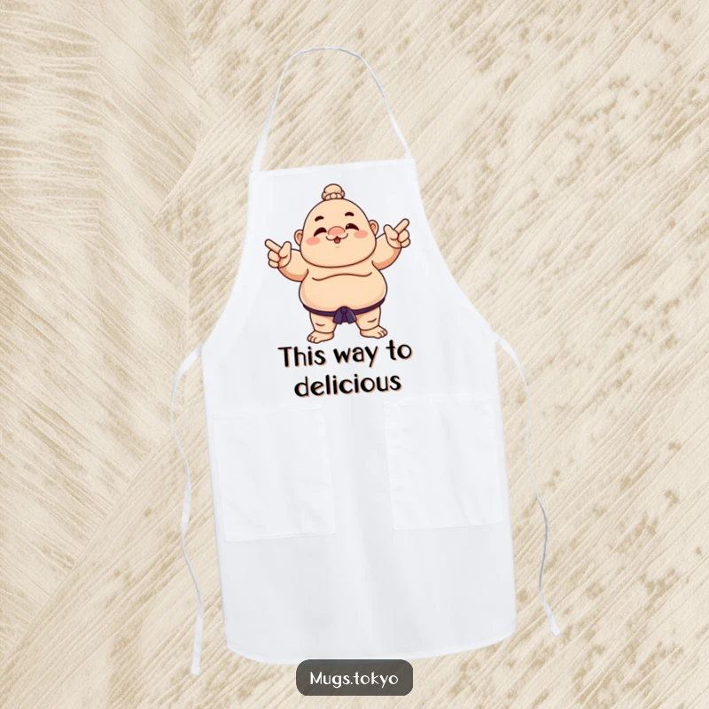 Funny apron with a sumo wrestler character playfully pointing, ideal for kitchen fun and protection.