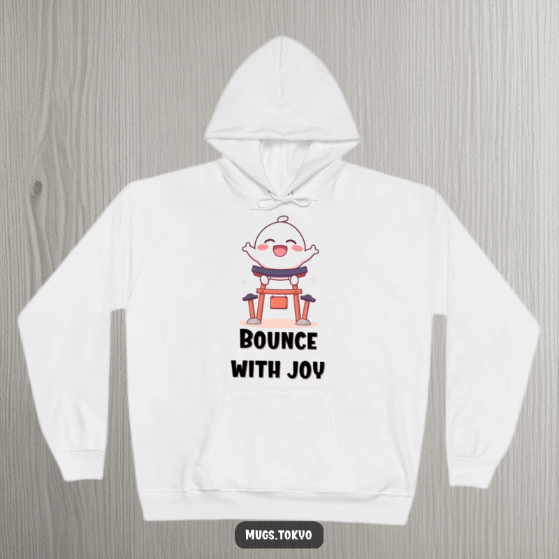 Funny hoodie featuring a bouncy dango character with a wide grin, leaping over a miniature shrine gate, perfect for cozying up.
