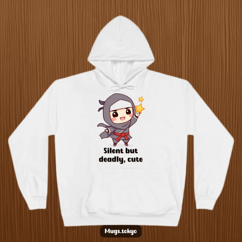 Funny Hoodie: A grinning ninja playfully tossing a throwing star, designed for comfort and ninja-inspired humor.
