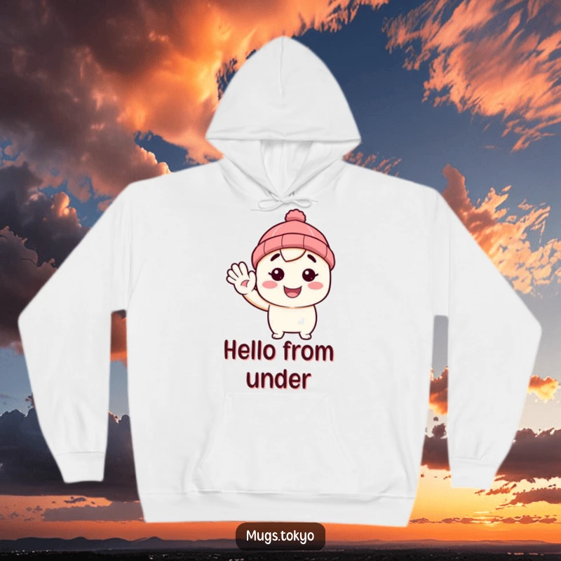 Funny hoodie featuring a character in a tiny beanie, waving hello with a smile. Cozy and humorous outerwear.