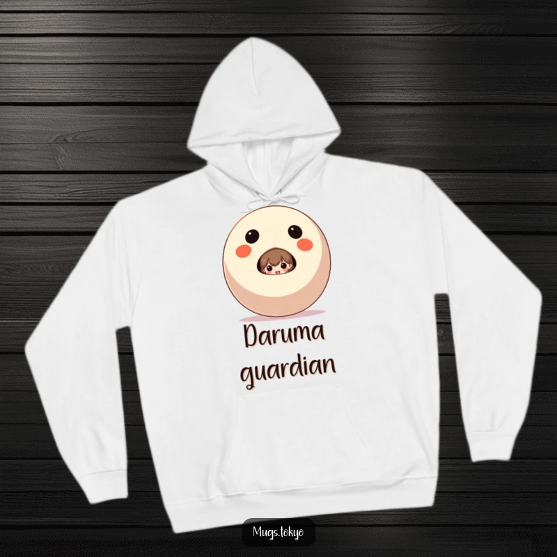 Funny Hoodie featuring a character peeking from behind a giant Daruma doll, offering warm, humorous comfort.