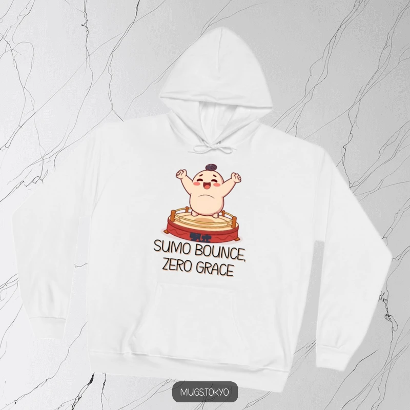 Funny hoodie featuring a character cheerfully bouncing on a small, stylized sumo ring, cozy and energetic.