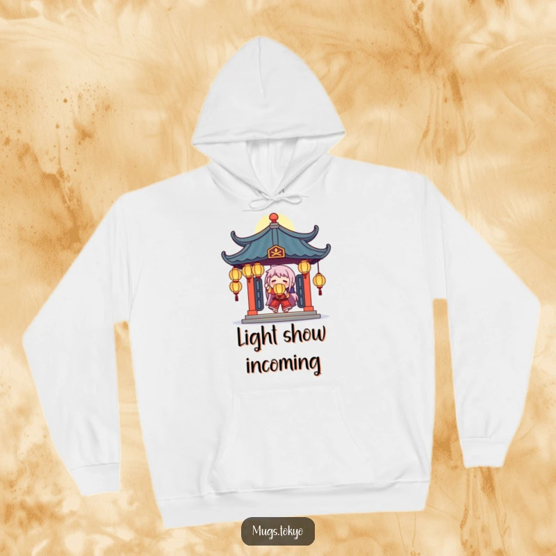 Funny hoodie with a character juggling glowing lanterns under a stylized temple roof, creating a warm and humorous atmosphere.