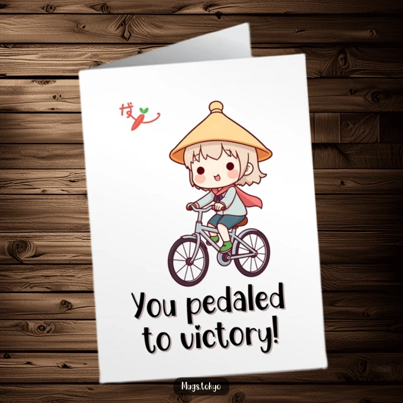 Funny Free Printable Congrats Card: Adorable character in a Japanese hat riding a bicycle, celebrating success with a cheerful journey.
